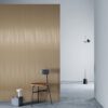3M DI-NOC ME-1223 Brushed Pale Brass architectural finish on a wall